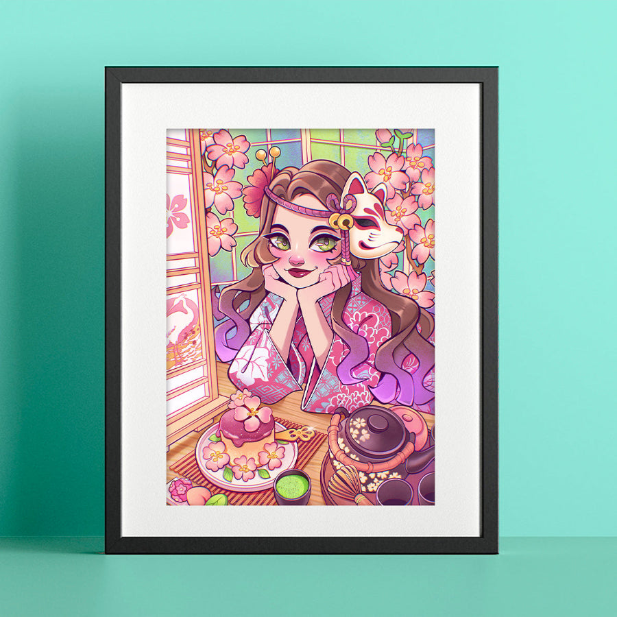 A framed art print featuring a colorful anime-style illustration of a girl in a pink kimono with a fox character, displayed against a mint green background.
