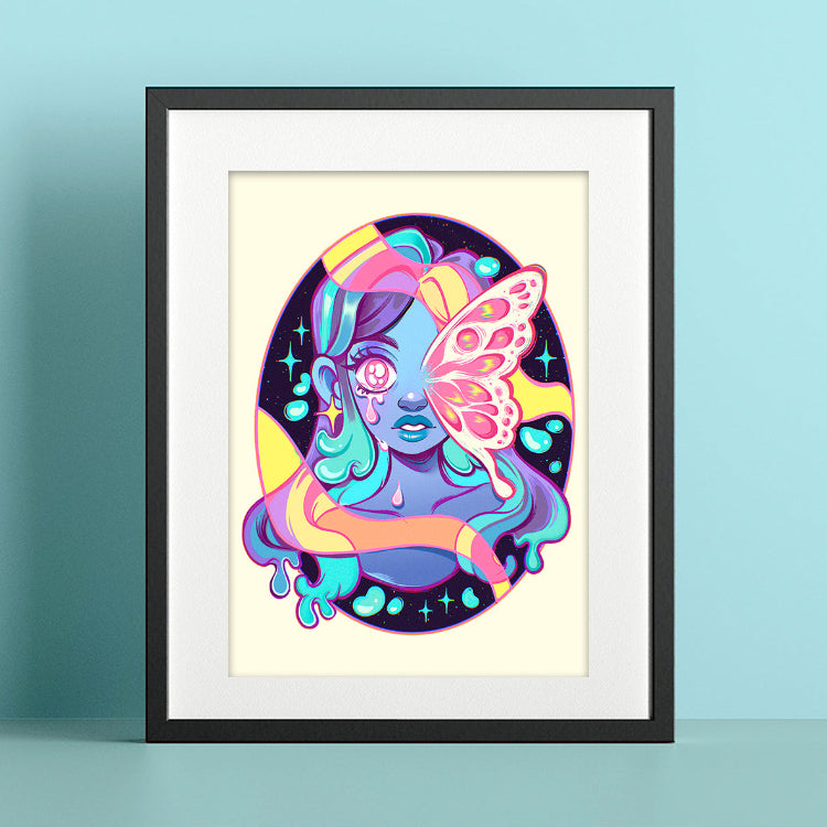Framed artwork of a colorful character with butterfly wings on a light blue background